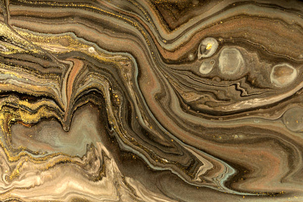 istock Gold marbling texture design. Beige and golden marble pattern. Fluid art. 1059933036