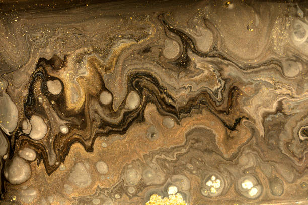 istock Gold marbling texture design. Beige and golden marble pattern. Fluid art. 1059933088