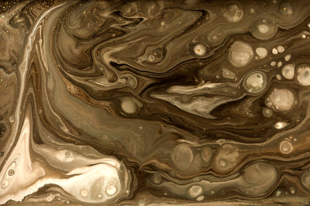 istock Gold marbling texture design. Beige and golden marble pattern. Fluid art. 1059933236