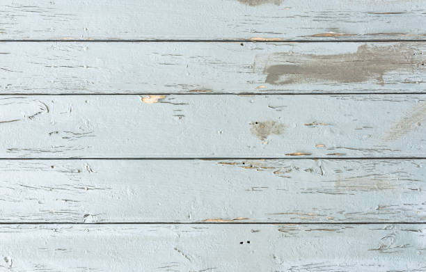 istock Grunge old gray painted wood planks background texure 1059948632