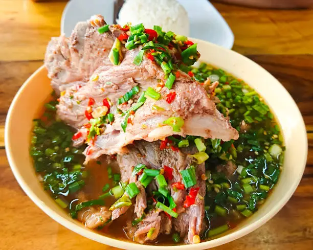 Photo of Hot and spicy soup with pork neck bones and Thai herbs that we called 