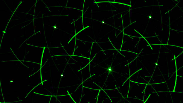 istock Drawing on a black wall with a green laser. Abstract drawing 1059955796