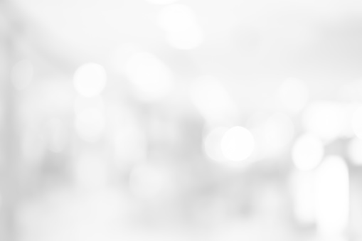 abstract blurred white color background with bokeh light for design concept