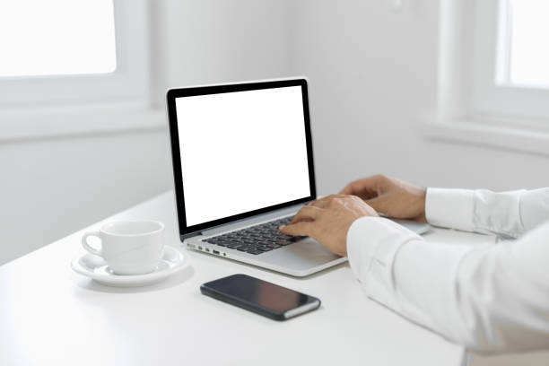 istock Businessman using laptop at desk 1059962868