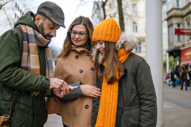 istock Family using smartphone for find a way in city 1059963246
