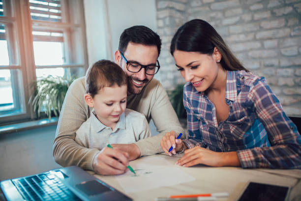 istock Modern family using a smart phone, mom, dad and their five year old son 1059964776