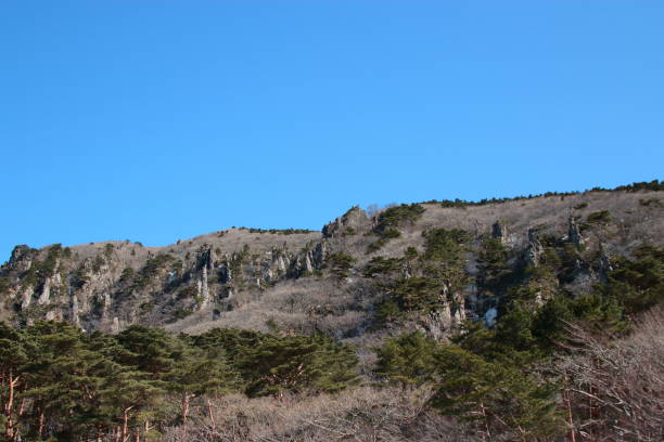 istock Mt. Hanra, winter, snow, mountains, rock, 1059965050