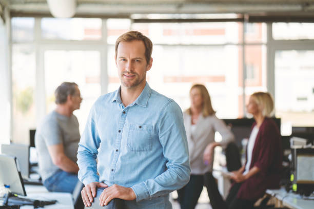 istock Portrait Of Confident Executive Standing At Office 1059977426