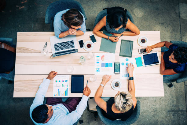 istock Group of financial professionals analyzing markets 1059979292