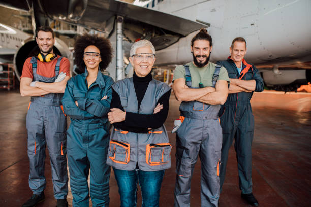 istock Older woman with aircraft mechanics 1059982134