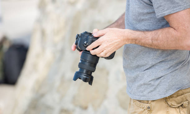 istock Senior Profesional Photographer 1059984748