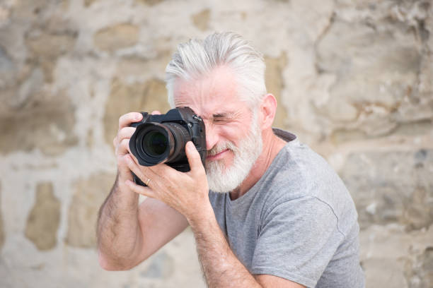 istock Senior Profesional Photographer 1059984768
