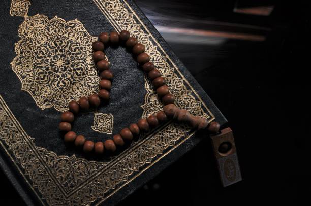 istock The holy Quran with prayer beads beads 1060000628