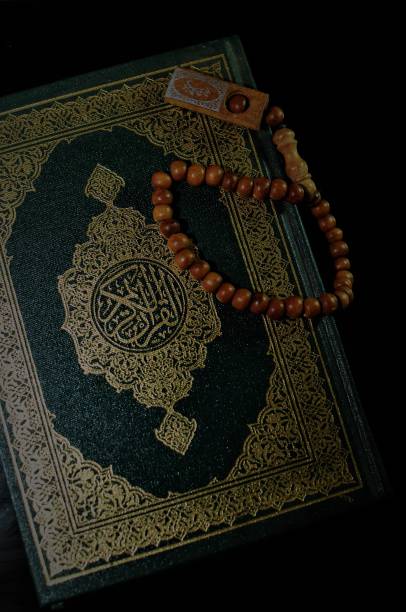 istock The holy Quran with prayer beads beads 1060000642