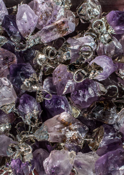 istock Raw violet amethyst rock with crystal ametist 1060000990