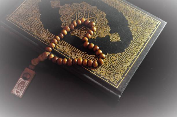 istock The holy Quran with prayer beads beads 1060001106