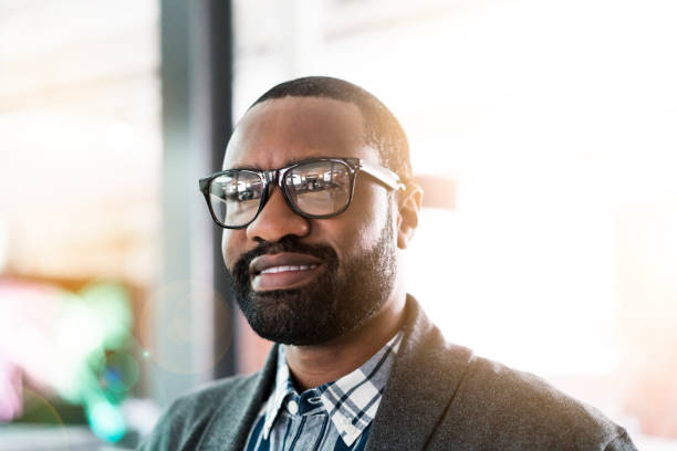 istock Close-up of thoughtful smiling executive at office 1060002900