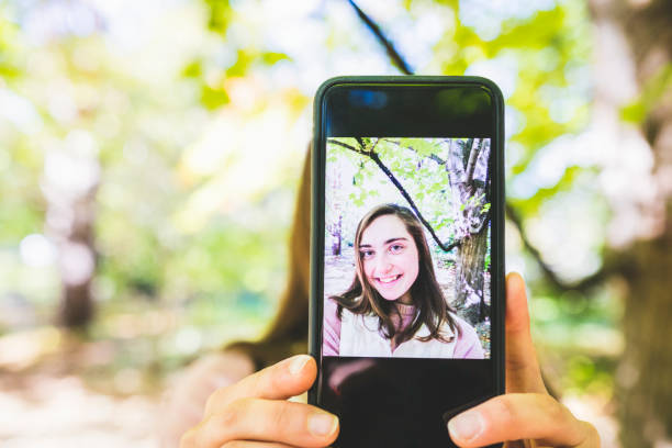 istock Selfie with my phone 1060005544