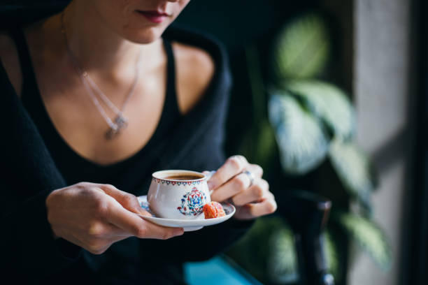 istock Woman drinking turkish coffee 1060008112