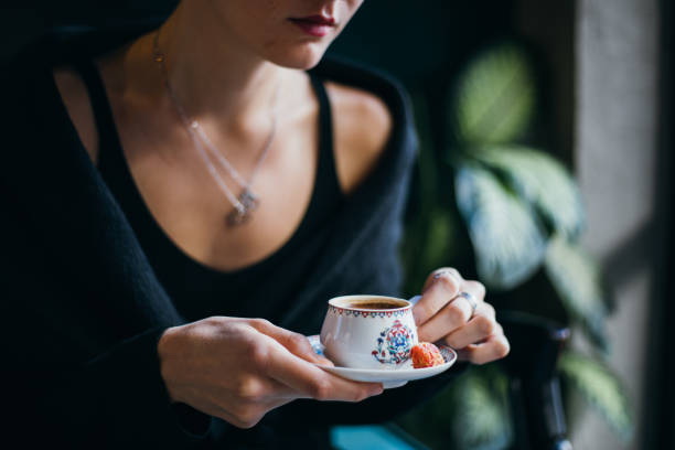 istock Woman drinking turkish coffee 1060008142
