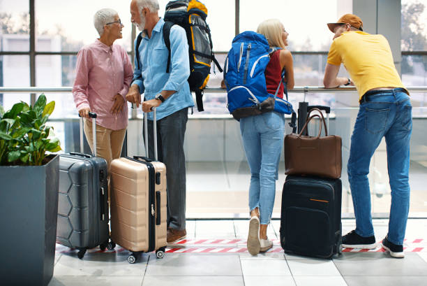 istock Young couple at an airport. 1060012362