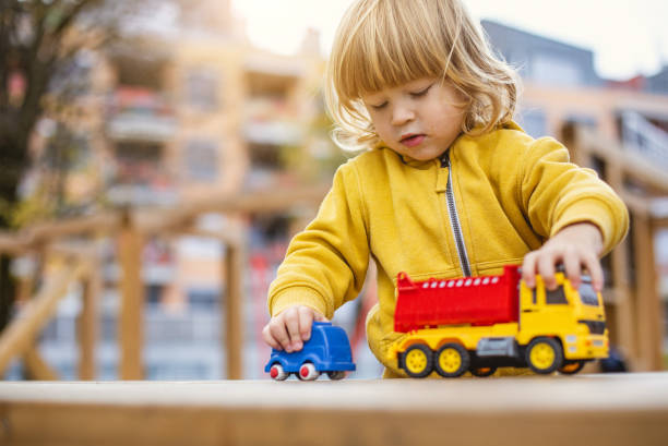 istock Toddler Playing in a Children's Playground 1060028544