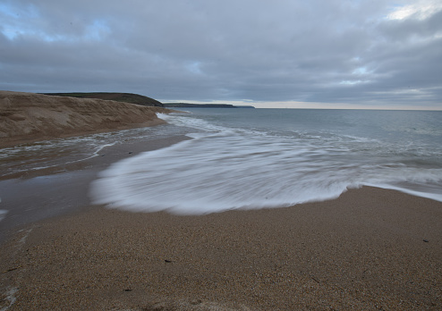The sand bar that separates the Loe Pool from the sea