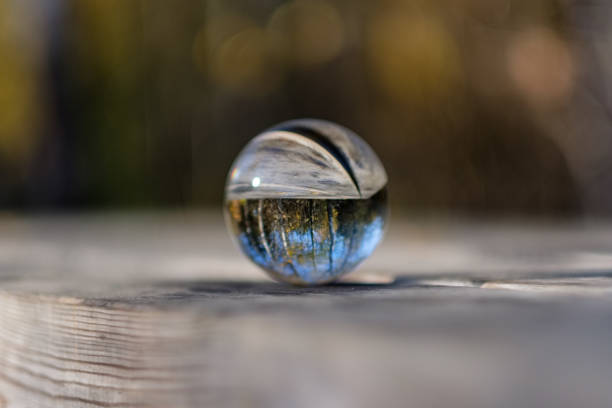 istock lensball in autumn reflecting nature 1060056450