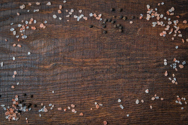 istock Cutting Board with salt and pepper. 1060065786