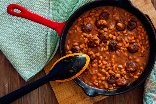istock beans with sausage on a cast iron skillet 1060066420