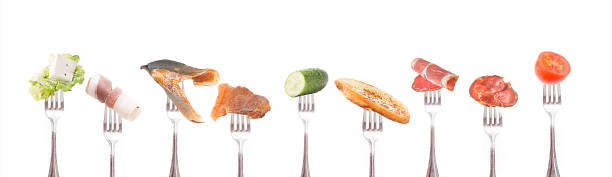 istock Fork with food on a white background. 1060094354