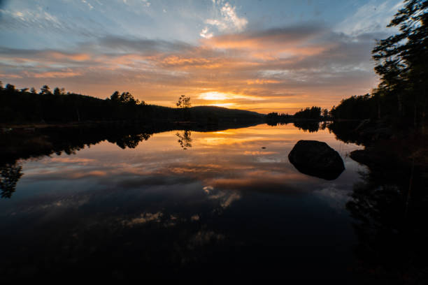 istock beautiful sunset over a swedish lake 1060115186
