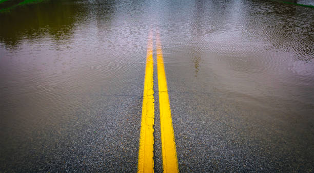 istock Road Leading into Flooded Street 1060121344