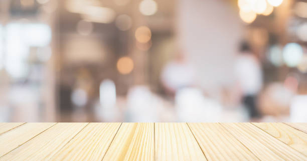 istock cafe restaurant or coffee shop with abstract bokeh lights defocused blur background with table for product display 1060130862