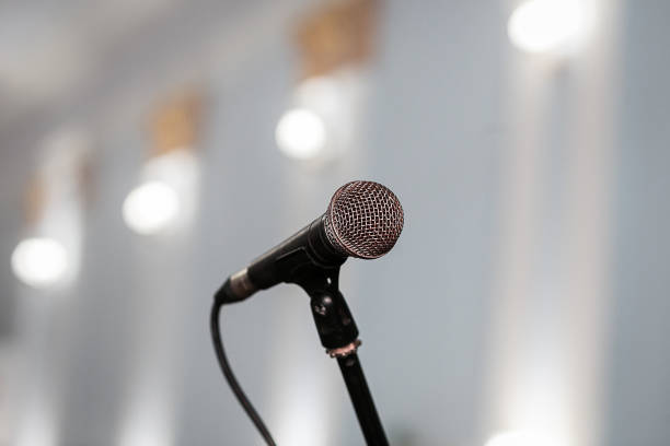 istock A microphone on stage in a concert hall or american bar (restaurant) during a show. 1060135318