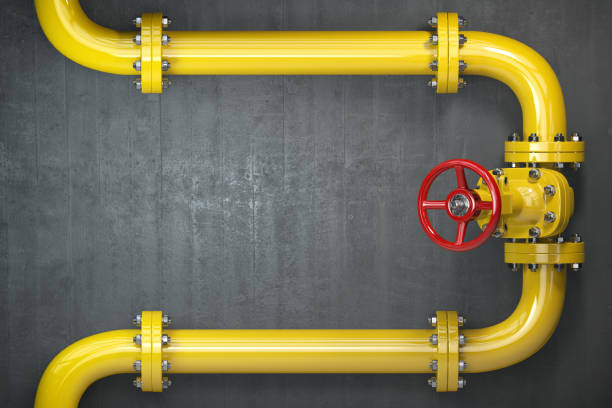 istock Gas pipeline valve on a wall. Space for text. Gas pressure control. 1060143820