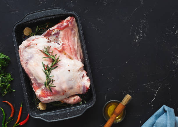 istock Shoulder of lamb ready  before slow cooking 1060146566