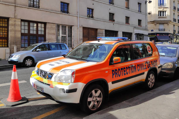 SUV of the Protection Civile de Paris Paris, France - October 23 2018: 4x4 of the "Protection Civile de Paris" parked outside of their office in the 5th Arrondissement of Paris. french civil protection stock pictures, royalty-free photos & images