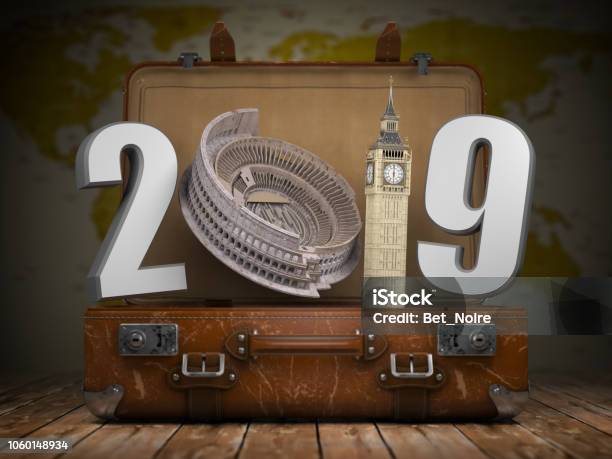 2019 Happy New Year Vintage Suitcase With Number 2019 As Coloisseum And Big Ben Tower Travel And Tourism Concept Stock Photo - Download Image Now