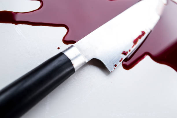 istock Blood stain and knife. 1060149068