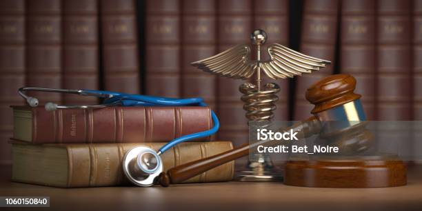 Gavel Stethoscope And Caduceus Sign On Books Background Mediicine Laws And Legal Medical Jurisprudence Stock Photo - Download Image Now