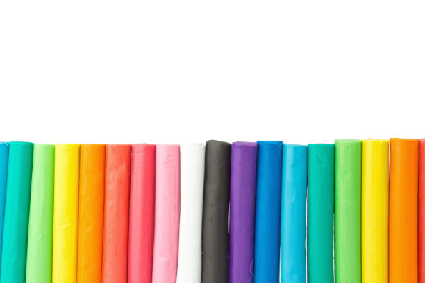istock clay. plasticine. play dough. wall colorful closeup isolated on white background 1060151212