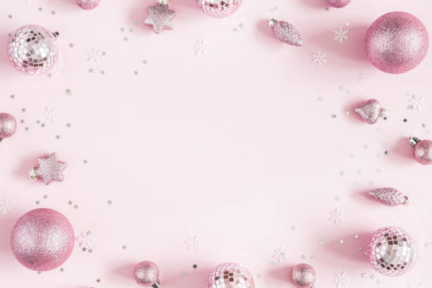 istock Christmas composition. Christmas pink decorations on pastel pink background. Flat lay, top view, copy space 1060167682