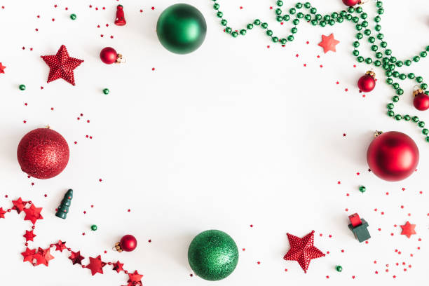 istock Christmas composition. Christmas red and green decorations on white background. Flat lay, top view, copy space 1060167770