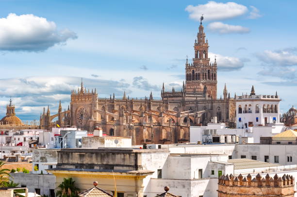 giralda tower and seville cathedral, spain - seville sevilla la giralda spain imagens e fotografias de stock