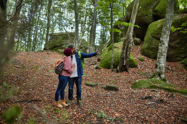 istock Couple taking selfie while hiking during autumn 1060169932