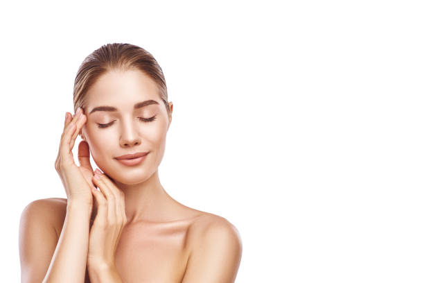 istock Beautiful woman face close-up studio on white 1060178514