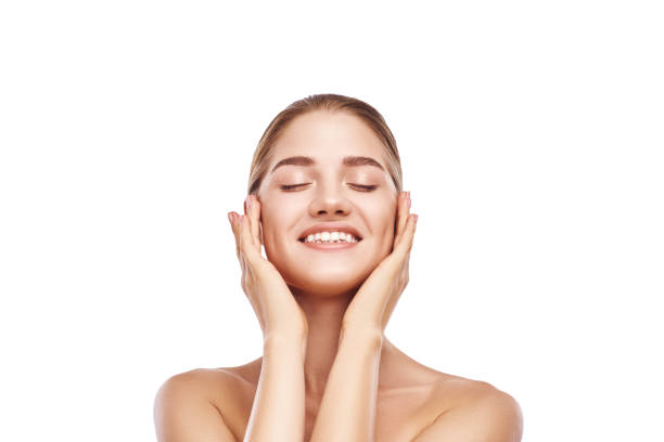istock Beautiful woman face is smiling close-up studio on white. 1060178526