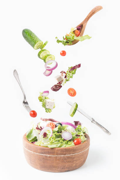 istock Salad with vegetables on white background. 1060181366