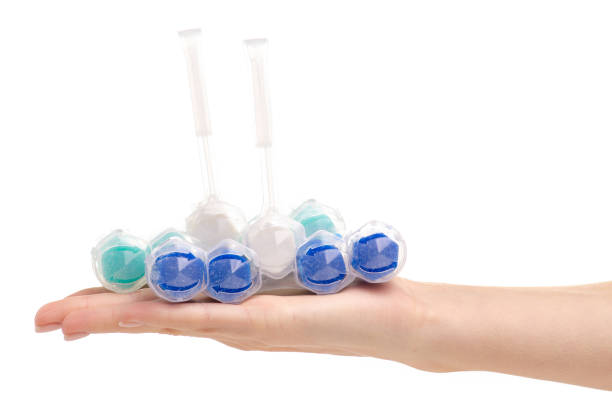 istock Toilet balls cleaner in hand 1060184480
